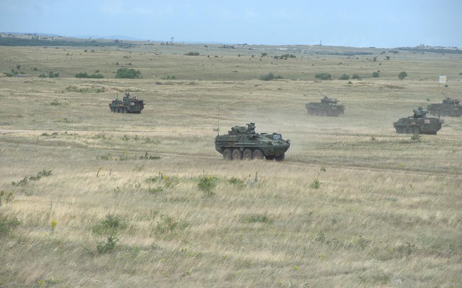 U.S. Army Stryker vehicles move into position during a coordinated fire support training mission. 