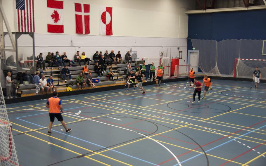 A hockey tournament took place while Canadian forces were deployed to Thule in support of Operation Boxtop, in September. The Danes won the tournament, held at the base fitness center. On the wall, the U.S., Canadian, Danish and Greenlandic flags.