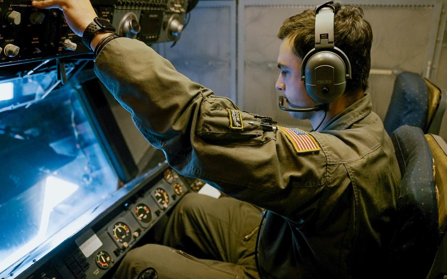 Staff Sgt. Jared M. Breaux is attentive to his position and responsibilities during a scheduled refueling mission aboard a KC-10A Extender.