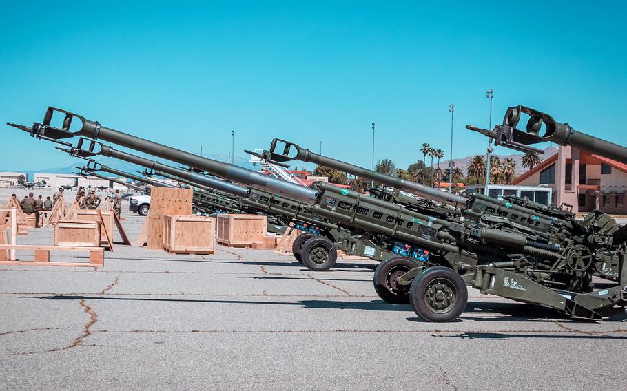 U.S. Marine Corps 155 mm howitzers are staged on the flight line prior to loading into an Air Force C-1 at March Air Reserve Base, Calif., April 22, 2022. Soldiers of the Florida Army National Guard are training Ukrainian soldiers on howitzers at the Grafenwoehr Training Area, Germany.