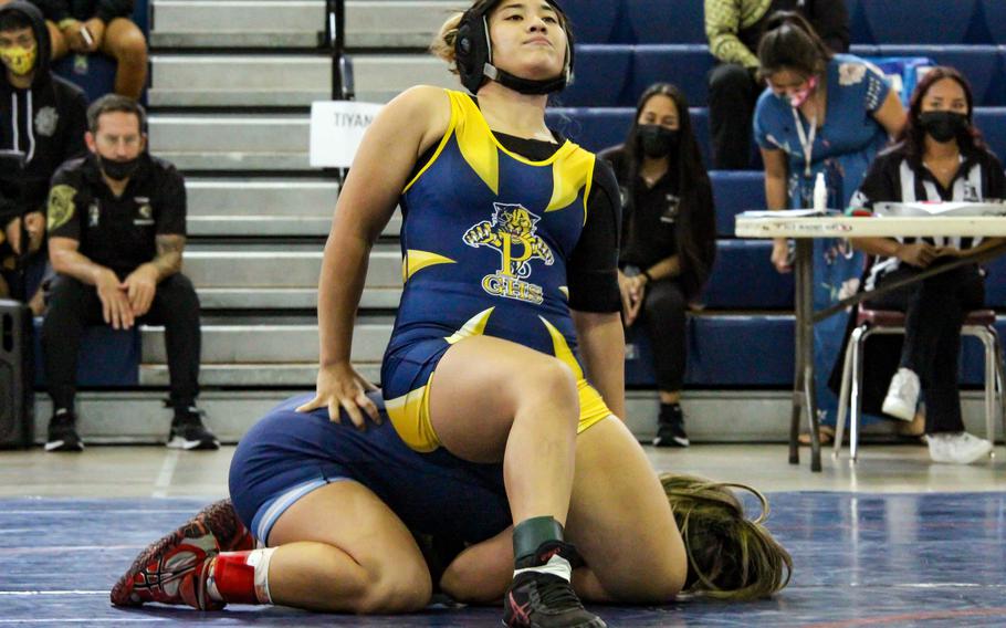 Guam High's Meghan Knaeble gets the upper hand on Notre Dame's Makayla Atoigue at 155 pounds during Saturday's Guam dual meets. Atoigue pinned Knaeble in 5 minutes, 4 seconds.