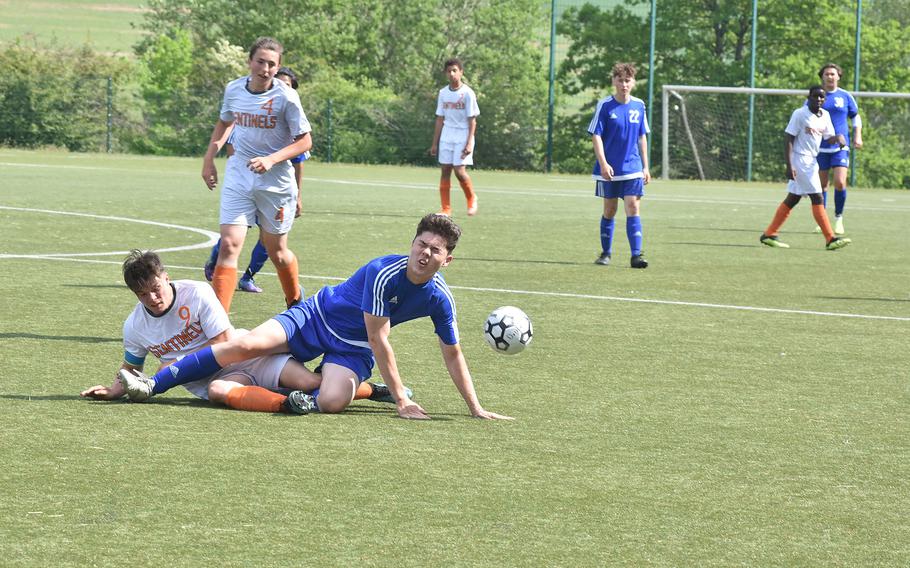 Spangdahlem's Brenden Castillo, left, and Hohenfels' Alexander Bothmann collide painfully Monday, May 16, 2022, at the DODEA-Europe boys Division III soccer championships in Reichenbach, Germany.