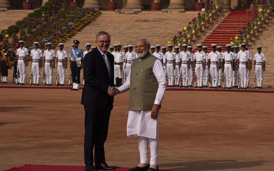 Indian Prime Minister Narendra Modi welcomes his Australian counterpart Anthony Albanese during laters's ceremonial reception at the Indian presidential palace, in New Delhi, India, Friday, March 10, 2023. Australia is striving to strengthen security cooperation with India and also deepen economic and cultural ties, Prime Minister Anthony Albanese said on Friday.
