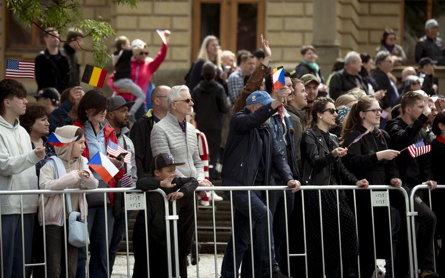 Spectators watch and cheer.