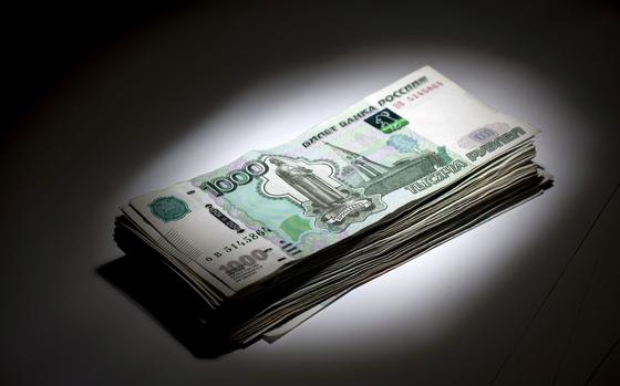 A stack of Russian 1000 ruble currency banknotes. MUST CREDIT: Bloomberg photo by Simon Dawson.