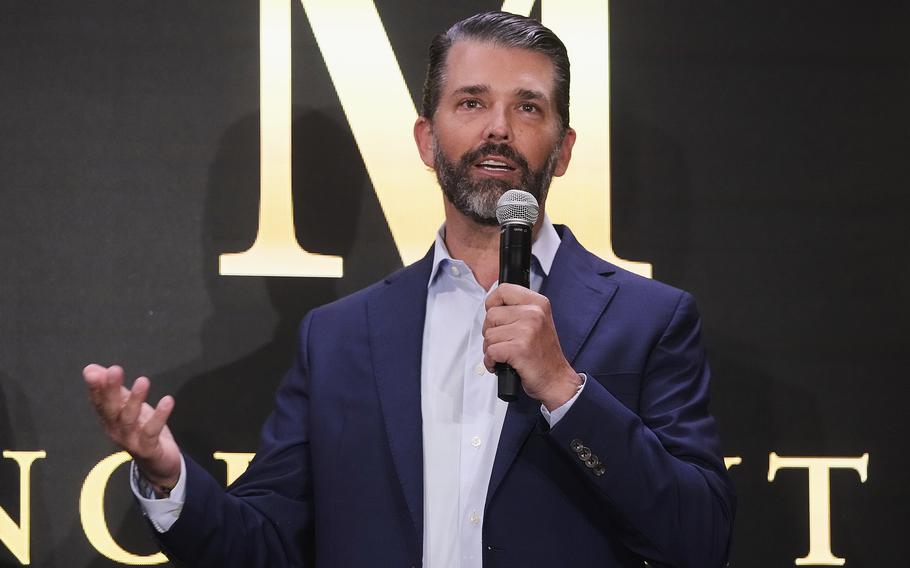 A man speaks into a microphone.