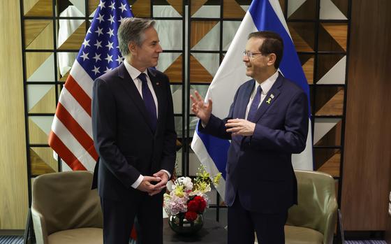 U.S. Secretary of State Antony Blinken, left, meets with Israeli President Isaac Herzog in Tel Aviv on May 1, 2024.