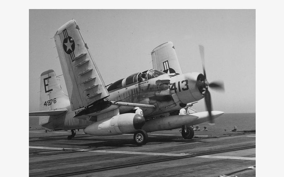 A Douglas AD-5 Skyraider attack plane is seen with its wings folded up. A Skyraider that was ditched in the Atlantic in 1957 was found by accident in deep water by divers on a routine training mission in July 2023.