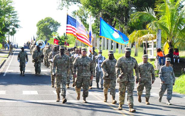 Virgin Islands National Guard march in Veterans Day Parade at Frederiksted, St. Croix, Virgin Islands, November 11, 2019. VING Soldiers and Airmen proudly march in the annual parades to honor all service members past and present of the armed forces.