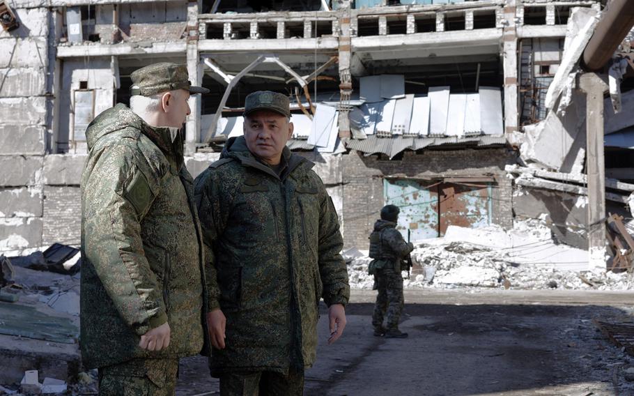 Russian Defense Minister Sergei Shoigu, right, shown in an undated photo released by the Russian Defense Ministry April 3, 2023, visits Russian troops deployed in occupied Ukrainian territory. While Russian ground forces have been eroded by the war, they have been able to replenish their ranks, said U.S. European Command’s Gen. Christopher Cavoli during a security conference Sunday. 