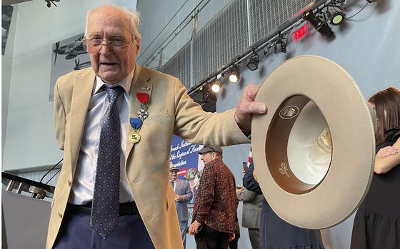 Samuel Meyer, 99, shows off a Stetson hat following ceremonies at the National World War II Museum in New Orleans, where he was awarded membership in the French Legion of Honor on Feb. 27, 2024.
