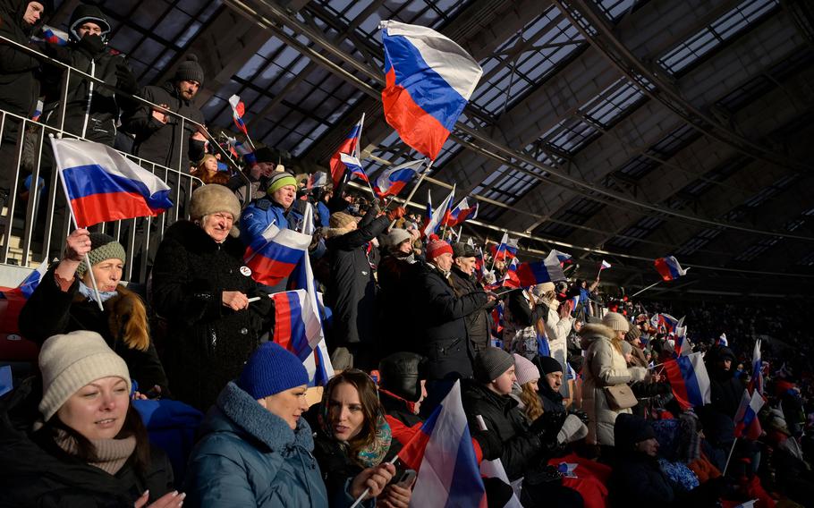 People attend a patriotic concert dedicated to the upcoming Defender of the Fatherland Day at the Luzhniki stadium in Moscow on Feb. 22, 2023.