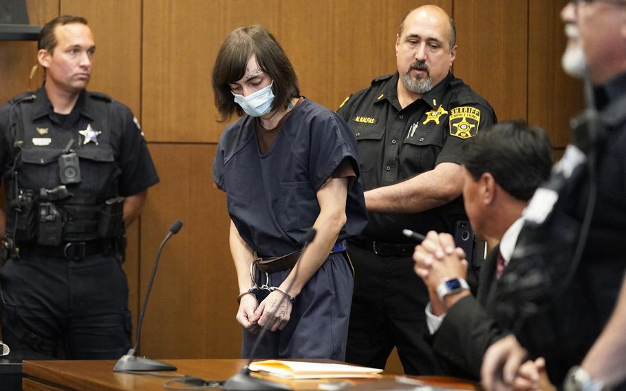 Robert E. Crimo III, walks in to the courtroom during a hearing in Lake County court Wednesday, Aug. 3, 2022, in Waukegan, Ill. Crimo III, accused of killing seven people and wounding dozens more in a shooting at an Independence Day parade in suburban Chicago pleaded not guilty on Wednesday, a week after prosecutors announced he faces 117 felony counts in the attack.