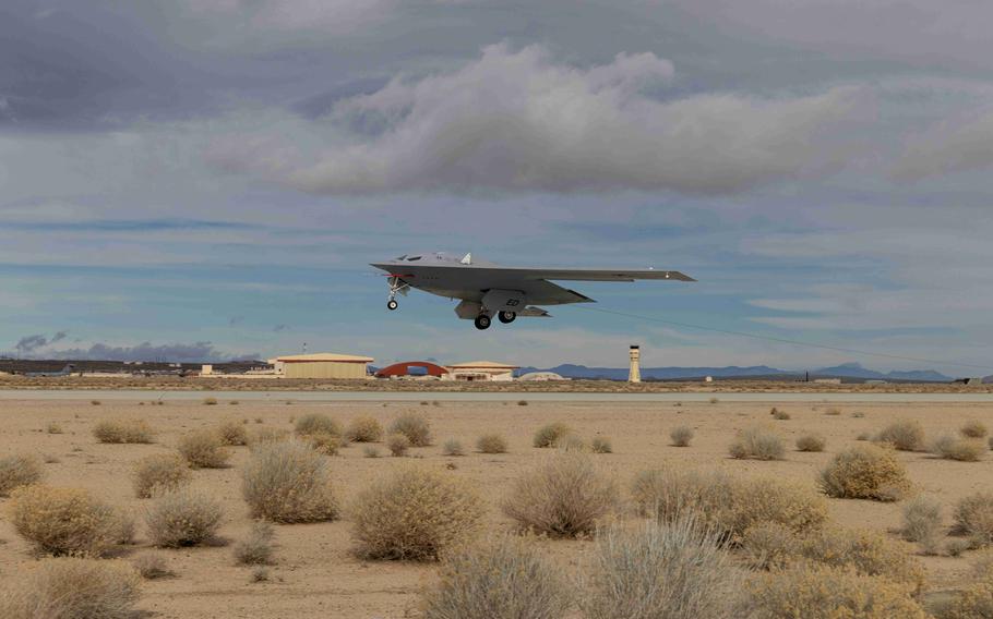 A B-21 Raider conducts flight tests, which include ground testing, taxiing and flying operations, at Edwards Air Force Base, Calif. The B-21 will possess the range, access and payload to penetrate the most highly-contested threat environments and hold any target around the globe at risk, the Air Force says.