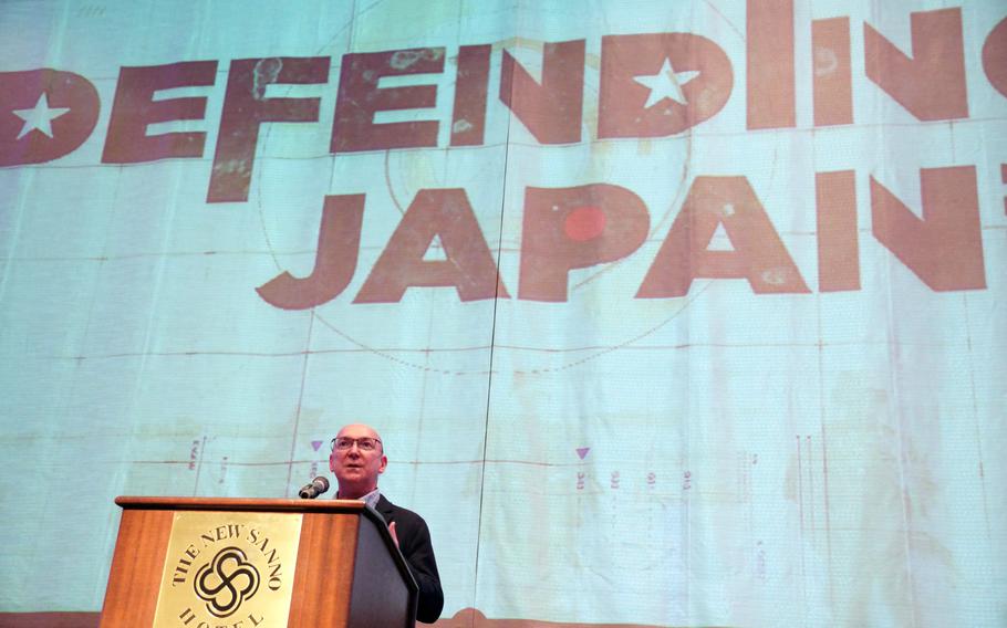 "Defending Japan" co-writer John Flanagan speaks about the show during an event at the New Sanno Hotel in Tokyo, Tuesday, Feb. 27, 2024. 