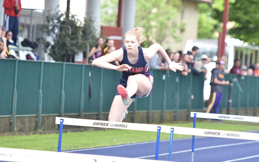 Addison Krajicek leaps a hurdle.
