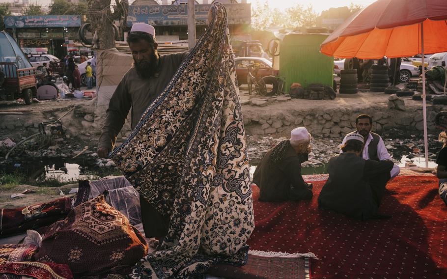 At the market, impoverished families are selling their home appliances and other goods to raise money. 