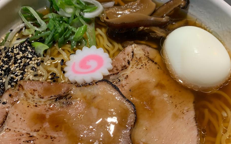 Staj Noodle Bar’s shoyu ramen includes a chicken and dashi broth with braised pork shoulder and traditional sides such as an egg and fish cake. 