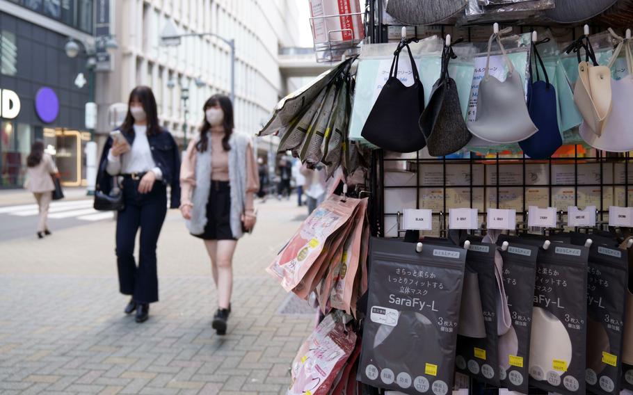 A variety of masks are for sale in Tokyo's popular Shibuya district, Friday, March 10, 2023.