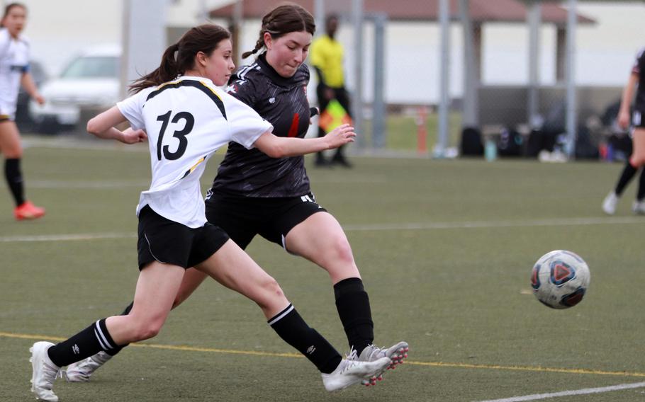 Nile C. Kinnick's Giovanna Kennedy (4) sends the ball upfield against American School In Japan during Thursday's Kanto Plain girls soccer match. The teams played to a 2-2 draw.