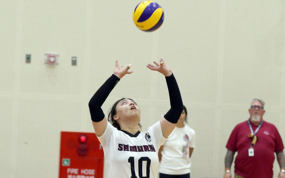 Matthew C. Perry's Kahana Pelletier sets the ball during Saturday's Japan girls volleyball matches. The Samurai split two matches with Fukuoka International and lost to E.J. King over the weekend.