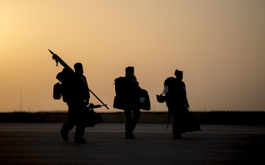 German service members head to the last Airbus A400M aircraft leaving the Mazar-e-Sharif airfield for home, as the German military mission in Afghanistan ends, June 29, 2021. 