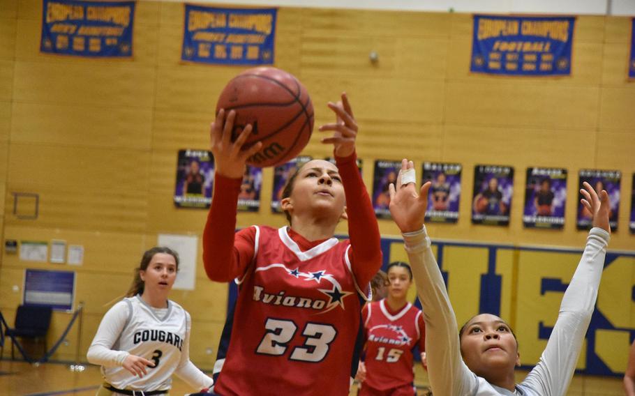 Aviano freshman Aubrey Cannon puts up a shot in the Saints’ loss to Vicenza on Wednesday, Feb. 14, 2024, at the DODEA European Division II Basketball Championships in Wiesbaden, Germany.