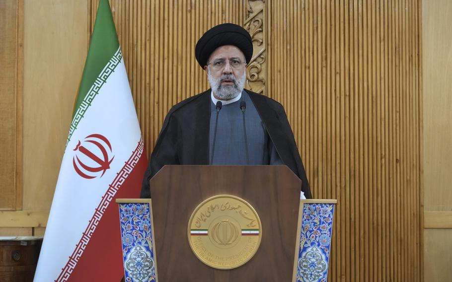 Iranian President Ebrahim Raisi speaks before departing Tehran's Mehrabad airport for a trip to Oman, Monday, May, 23, 2022. 