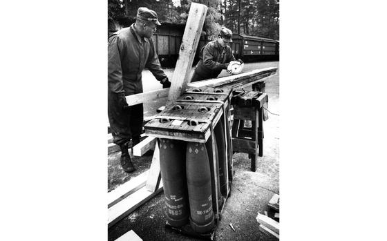 Muenster, Germany, November, 1990: Pvt. Dondi Holsey and Spec. Tom Cicione of the 184th Ordnance Company at Muenster Army Depot cut lumber to be used as shipping braces for 155mm Howitzer ammunition on its way to the Middle East during Operation Desert Shield.

Looking for Stars and Stripes’ Gulf War coverage? Subscribe to Stars and Stripes’ historic newspaper archive! We have digitized our 1948-1999 European and Pacific editions, as well as several of our WWII editions and made them available online through https://starsandstripes.newspaperarchive.com/

META TAGS: Gulf War; Operation Desert Shield; Operation Desert Storm; U.S. Army; 184th Ordnance Company