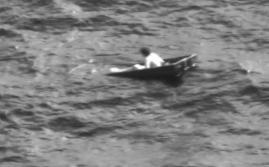 The search for a missing boater came to a dramatic end when the U.S. Coast Guard found him drifting 12 miles off St. Augustine, Fla. — in a boat that was largely underwater, officials say.
