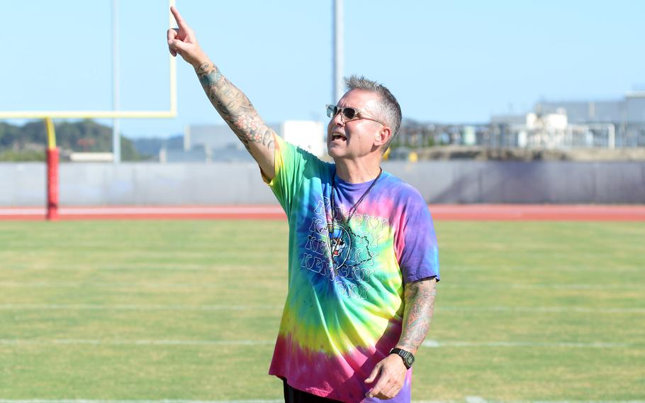Dan Joley makes a point in practice.
