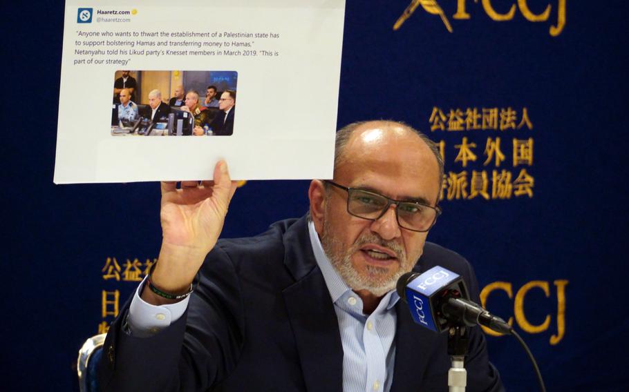 Palestinian diplomat Waleed Siam speaks to reporters at the Foreign Correspondents’ Club of Japan in Tokyo, Friday, Oct. 13, 2023.