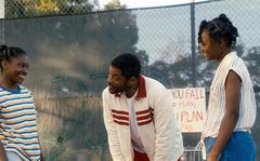 This image released by Warner Bros. Pictures shows Will Smith, center, with Demi Singleton, left, and Saniyya Sidney in a scene from "King Richard." 