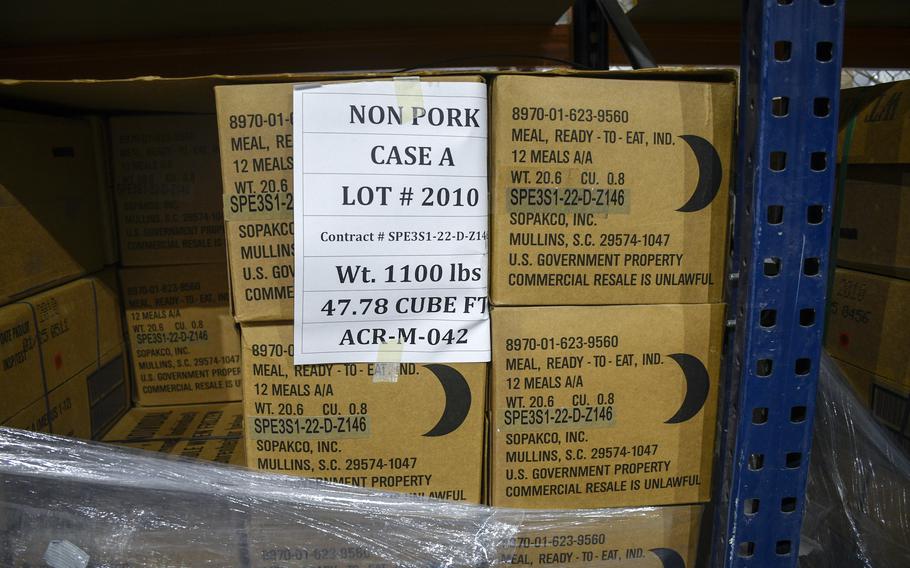 Military rations are stacked up at Al Udeid Air Base in Qatar to be placed onto a U.S. Air Force cargo plane and airdropped into the Gaza Strip.