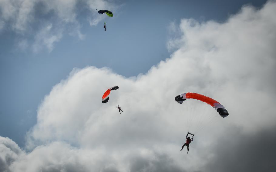French and American parachutists descend over Berlats, France, May 27, 2022. The jumpers commemorated the 1944 night landing of U.S. soldiers of Office of Strategic Services, which contributed to a turning tide against the fight against Nazi troops in Southern France.