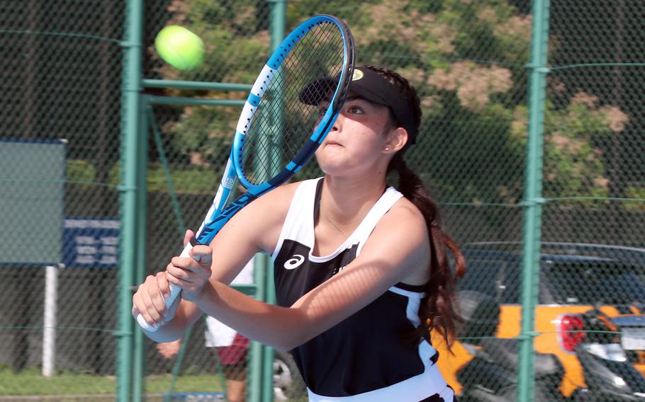 E.J. King's Joanna Hall hits a backhand against Matthew C. Perry's Ivanelis Nieves-Bermudez during Saturday's DODEA-Japan tennis matches. Nieves-Bermudez won 6-2.