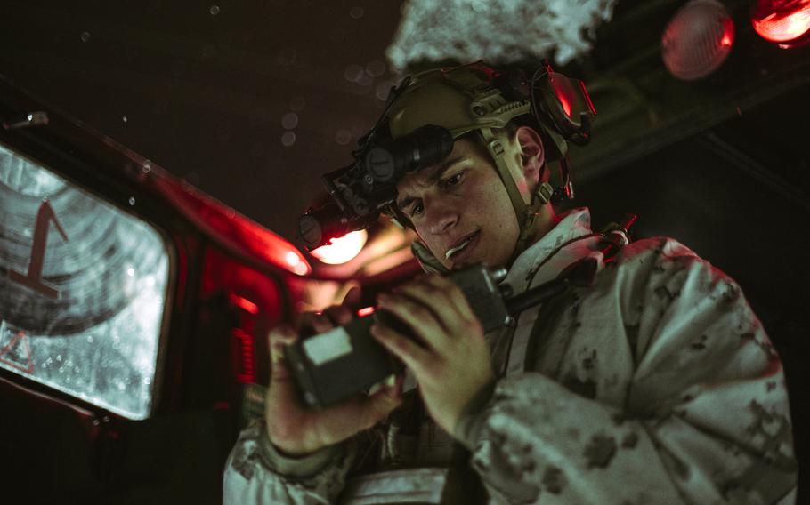 U.S. Marine Cpl. Chance Morsch, a rifleman in the 3rd Battalion, 6th Marine Regiment, 2nd Marine Division, checks radio connectivity March 3, 2022, ahead of Exercise Cold Response in Setermoen, Norway.