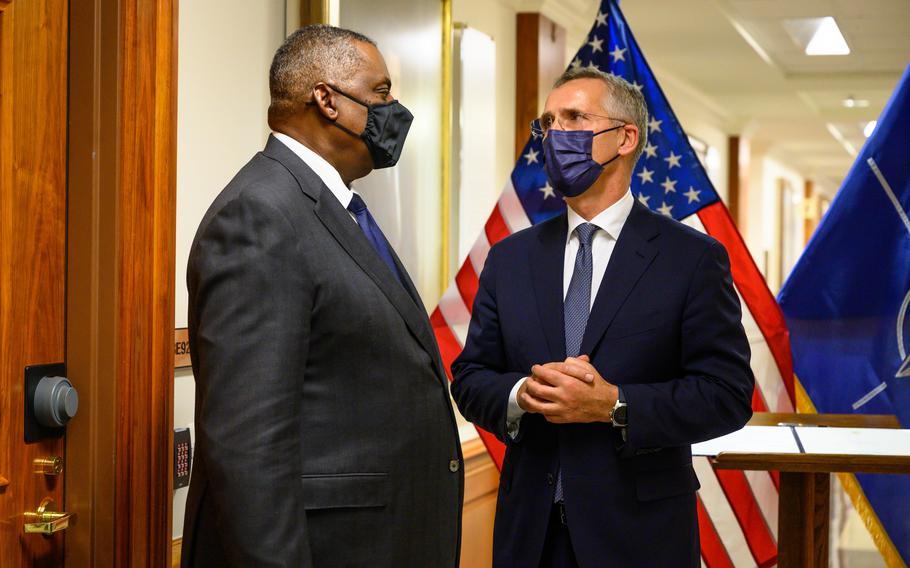 Secretary of Defense Lloyd Austin speaks with NATO Secretary General Jens Stoltenberg at the Pentagon, Washington, D.C., Oct. 4, 2021.