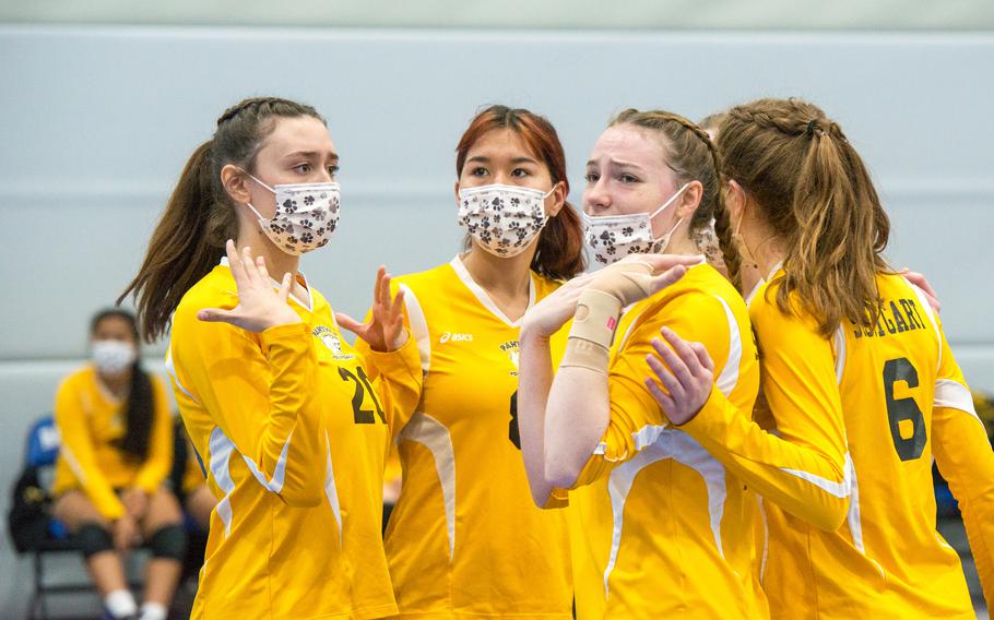 Members of Stuttgart’s Panthers look at the score against the Black Forest Academy Falcons during a team huddle at the DODEA-Europe Division I Volleyball Tournament at Ramstein Air Base, Germany, Oct. 29, 2021.