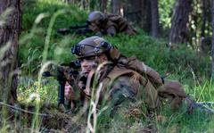 A U.S. Marine assigned to the 22nd Marine Expeditionary Unit trains with NATO allies in Ustka, Poland, June 14, 2022. The U.S.-led NATO alliance in a matter of weeks is expected to adopt a plan to send more weaponry and combat units to defend its eastern flank.