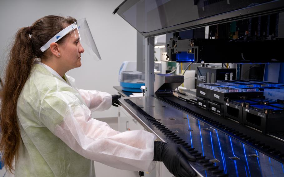 Samantha Koch, a biotechnology laboratory scientist, works in the lab.