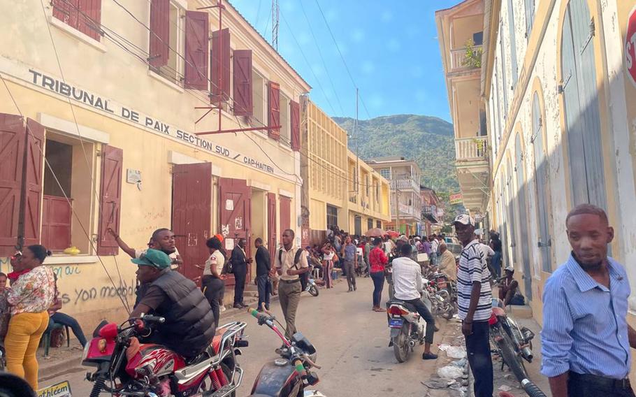 In Cap-Haïtien, where a near-riot almost broke out shortly after U.S. President Joe Biden announced a new parole program for nationals of Haiti and three other countries, people crowd the immigration office on Jan. 21, 2023. All are trying to apply for a passport so they can be considered for the program, which requires a financial sponsor in the U.S.