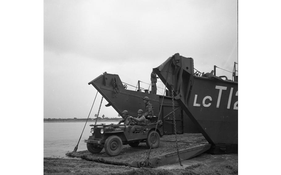 A jeep emerges from a LTC 1283 landing craft