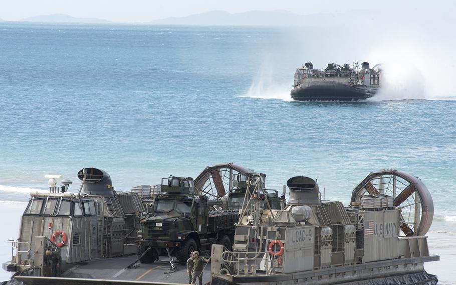 U.S. Navy hovercraft from the USS Green Bay and USS Ashland land on Langham Beach during the Talisman Sabre finale near Stanage Bay, Australia, Wednesday, Aug. 2, 2023. 