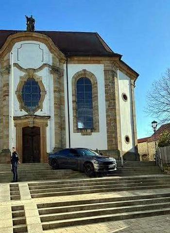 An American driver followed his car's GPS around a construction area and ended up on the steps of St. Aegidius Parish Church near the market square in Vilseck, Germany on October 27, 2022, according to local police.  The city has a large US military presence.