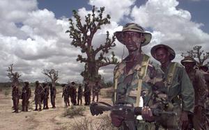 Thies, Senegal, Aug. 21, 1997: Senegalese soldiers at the Camp Thies training area. American Special Forces soldiers are in the middle of a two-month pilot program to teach African armies basic peacekeeping tactics under a U.S. sponsored project called The African Crisis Response Initiative. With a $15 million budget put up by the United States, the training program has camps at Thies, Senegal and at Kalama Hill, in Kabamba, Uganda.

Read Stars and Stripes' original reporting on the initiative here.

Interested in other articles on the initiative? ? Subscribe to Stars and Stripes’ historic newspaper archive! We have digitized our 1948-1999 European and Pacific editions, as well as several of our WWII editions and made them available online through https://starsandstripes.newspaperarchive.com/

META TAGS: Africa; peacekeeping; training; Senegal; Uganda; U.S. Special Forces; 