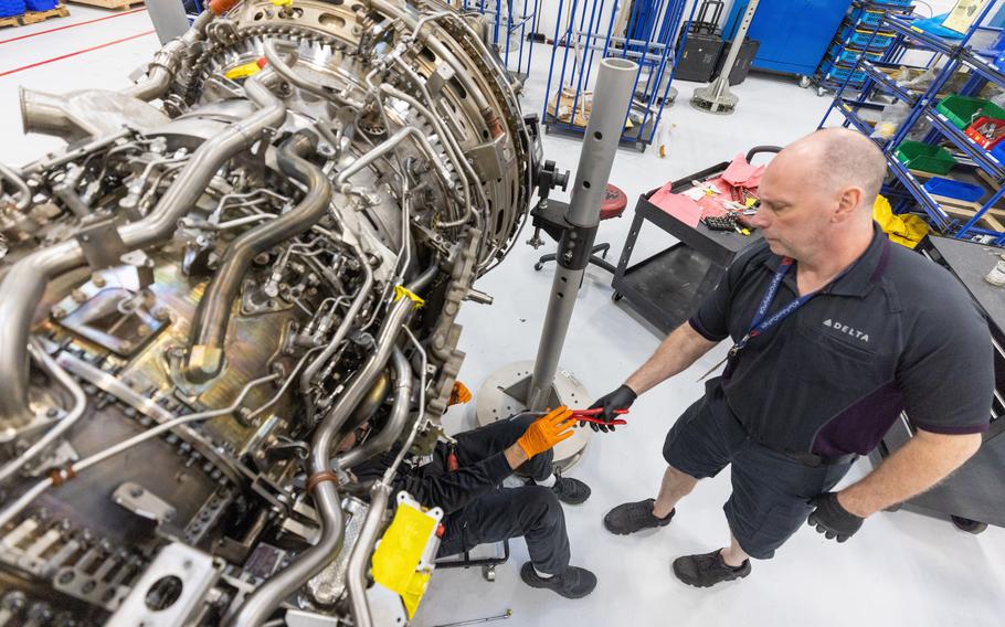 Airframe and Power Plant mechanics work on a Gear Turbine engine in Delta’s new facility Feb. 7, 2023. Engine manufacturer Pratt & Whitney will bring 400 new jobs to its Columbus, Ga., operation with a $206 million expansion.