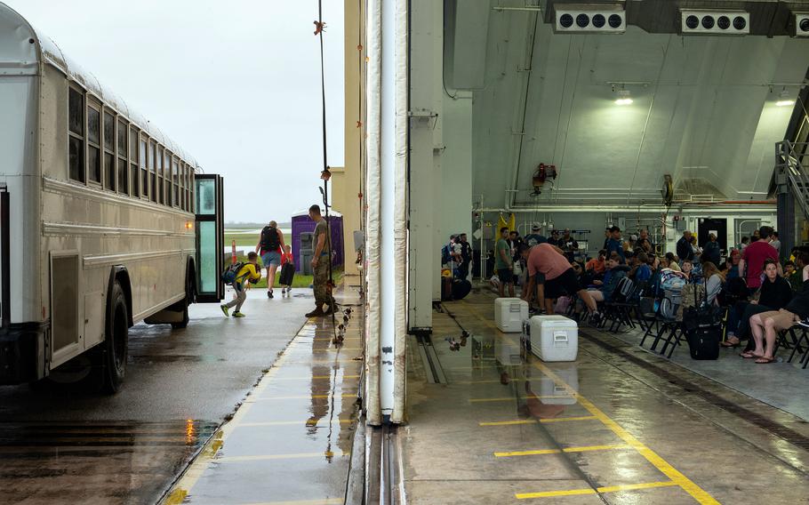 Outbound airmen and their families are dropped off at a temporary passenger termainal on Andersen Air Force Base, Guam, May 30, 2023l.