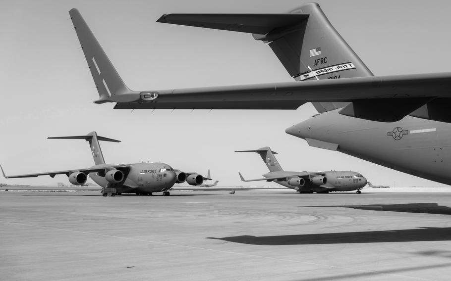 At al-Udeid Air Base in Qatar, American C-17s wait in August 2021 to ferry Afghan civilians being evacuated from Kabul. Al-Udeid is the largest U.S. military installation in the Middle East.