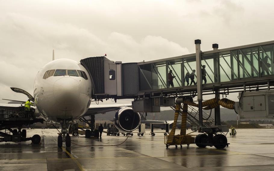 Passengers arrive at the Ramstein Air Base, Germany, passenger terminal in 2016. The Defense Department will roll out a replacement to the Defense Travel System over the next three years.